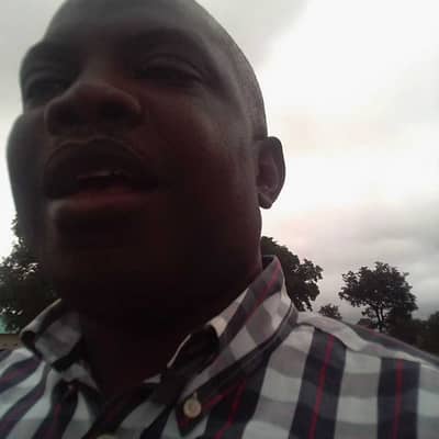 john kom
